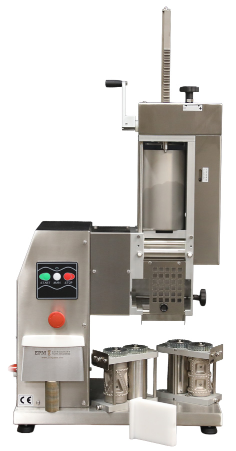 Front view of the Dupla Ravioli Machine, with a ravioli mold inserted.